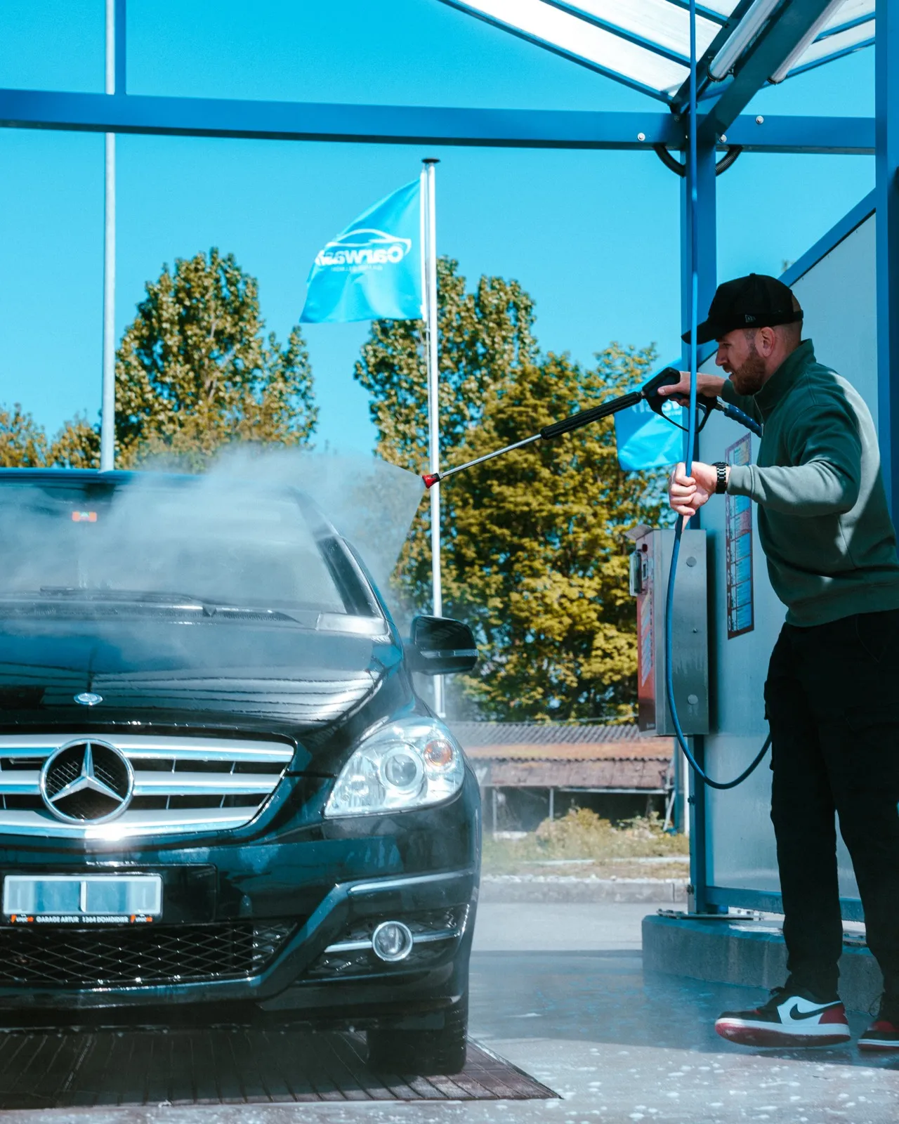 Lavage haute pression à la lance sur une station Hydrowash